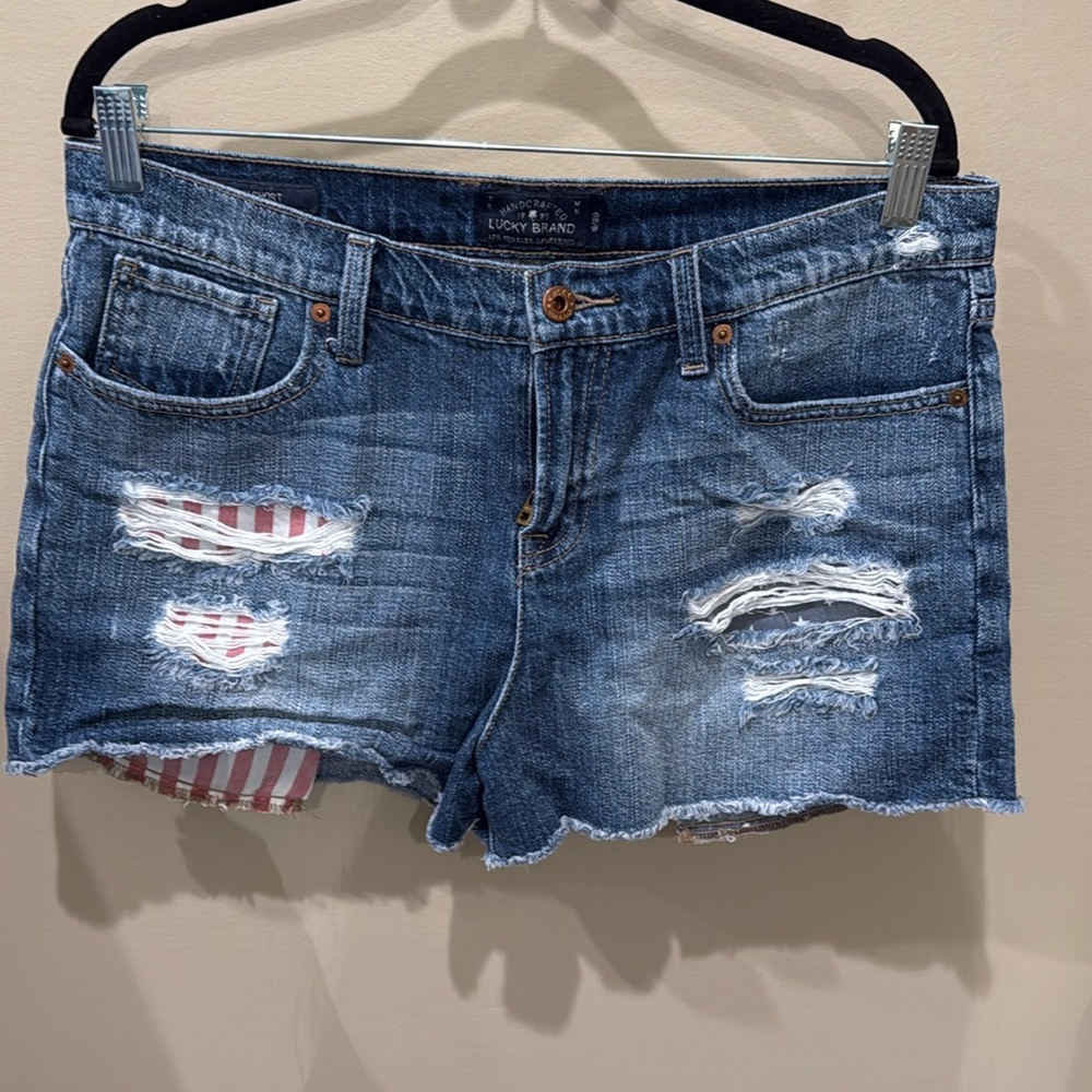 Lucky Brand American flag pocket denim shorts.
